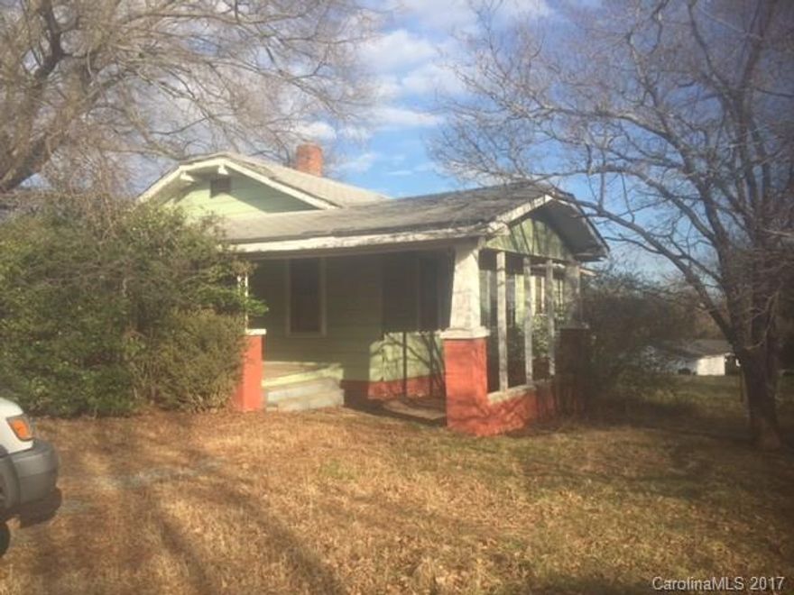 ATTENTION INVESTORS!!  Fixer upper with lots of potential!!  This home offers 2 bedrooms, 1 bath, a large living room with wood floors, a 1 car carport and much more.  Bring offers!!