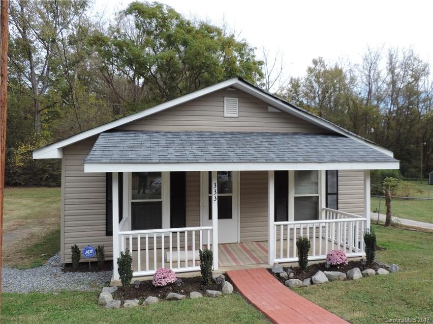 Beautiful 3 bedroom home with front porch. Rear deck with private back yard. New appliances and carpets, fresh paint ready to move in. Washer and dryer included. Lawn service and security alarm included in rent.