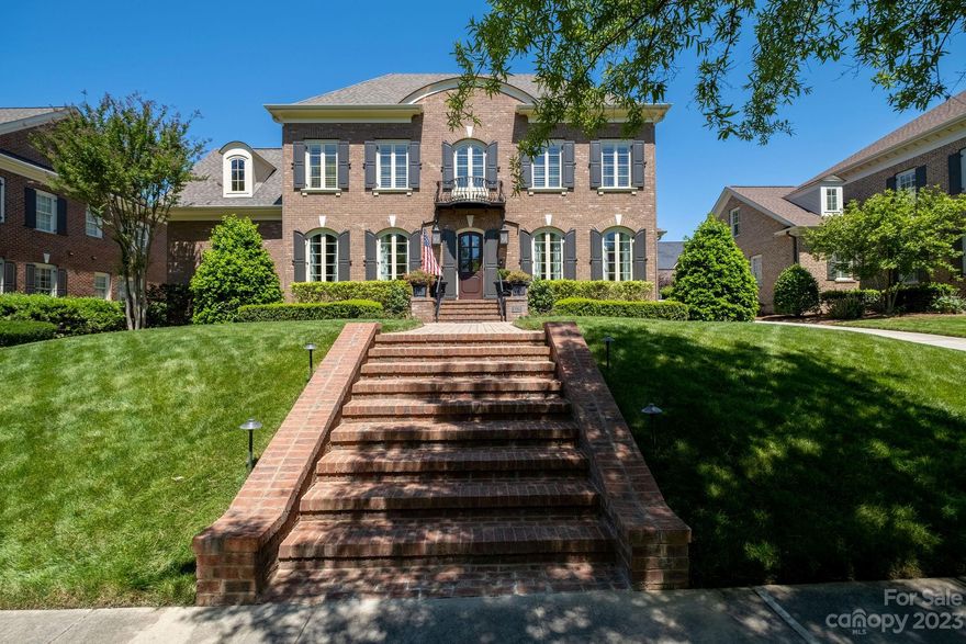 FABULOUS full-brick Simonini custom home with upgrades throughout! This Heydon Hall gem features arched casement windows, 10’ ceilings, hardwoods & extensive 3-piece crown moldings and millwork throughout.

Beautiful chef's kitchen w/large breakfast bar and Butler's pantry w/Wolf wine cooler. 

Main level Owner’s Suite with sliding doors leading to Gorgeous PRIVATE back covered patio leading to backyard gathering area overlooking stone & brick gas fireplace & natural stone waterfall. 

Upstairs media room, office/study room with French doors, plus 3 large Bedrooms and 2 Full Baths! Outstanding storage space in 5 different attics! Plantation shutters throughout. 3-Car Attached Garages complete with epoxy coated flooring and storage shelving. Whole-house water filtration.

Located on a rare, 80’ wide lot in the heart of gated Heydon Hall, one of South Charlotte’s premier neighborhoods!