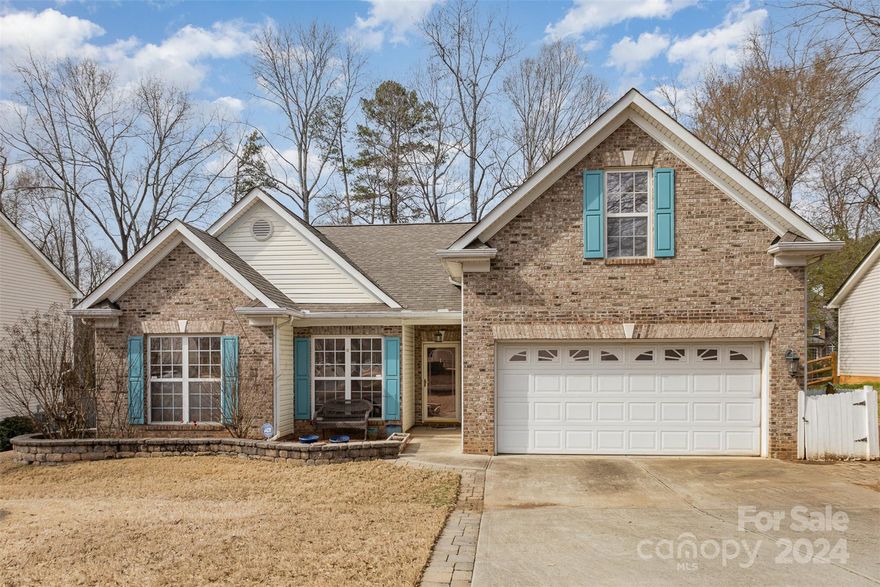 This newly painted ranch style 3 bedroom 2 full bath home in sought after Colton Ridge has just hit the market so come see it today. Enter the home from the covered front entry onto the hardwood floors in the entrance hall with decorative wainscotting. Home has a large primary bedroom with bathroom and spacious walk in closet. Separate bathtub and shower combo along with his and her sinks with plenty of counter and cabinet space. Open floor plan includes family room with gas log fireplace that opens to dining area and kitchen area which is fantastic for family get togethers or parties. Bonus room upstairs gives you an area for a media/playroom or private living room or a private office. Large fenced in back yard w/shed for storage along with a patio and deck for entertaining. (roll out awning included) Neighborhood has walking trails, sidewalks w/street lights, tennis courts, club house, pond and pool. New roof and A/C installed in 2022. Two car garage has extra storage space.