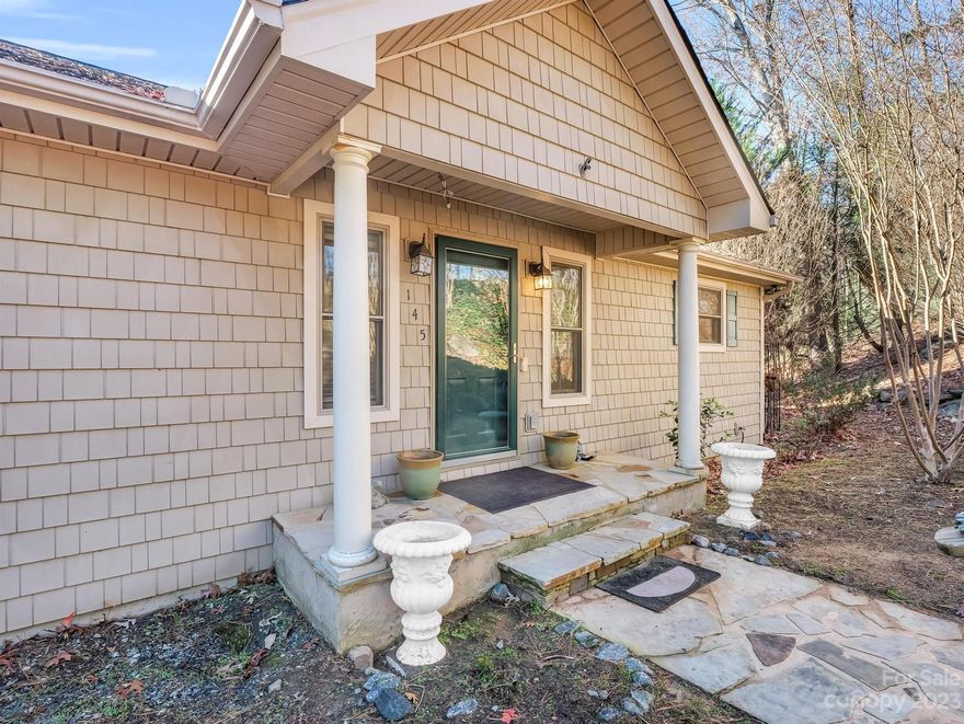 Handyman special behind the gates in Rumbling Bald on Lake Lure, just a short golf cart ride to all the amenities. Great layout with 2,389 sq ft. Main level boasts hardwood floors, great room w/ vaulted ceilings & floor-to-ceiling stone gas-fireplace, dining area, huge kitchen, primary en-suite bedroom, laundry room, and an add'l 1/2 bath.  Finished basement offers 2 bedrooms, family room, full bath, bonus room, and a 225-sq ft utility room. The decks on the upper and lower levels extend the full length of the house. Priced to allow for repairs & updates. An engineer shared a thumbs up on the decks structure, recommending replacement of pickets, rails, and deck boards. There are interior settling cracks in the basement, which will be easy to address. With improvements, market value will be worth the investment! Ideal as rehab/flip, vacation or annual rental, or as private residence, mountain home. Refer to virtually staged 3-D tour to see its potential.