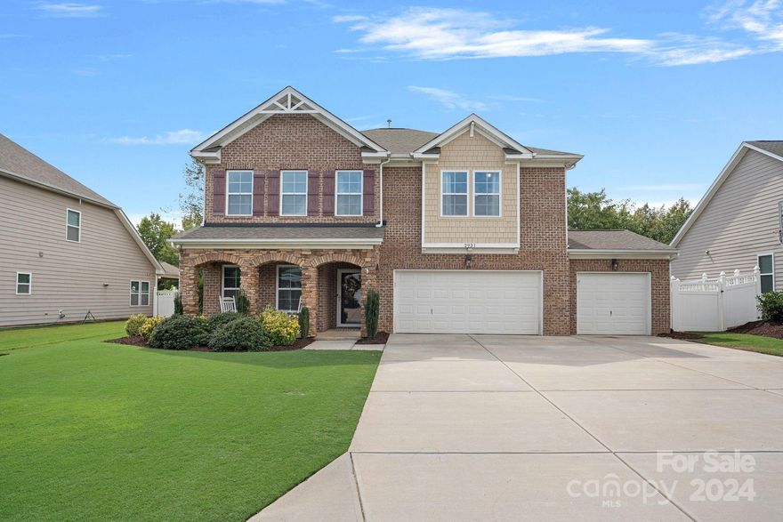 Gorgeous and spacious 5 bedroom home w/ a rocking chair front porch! Step inside to an open floorplan with hardwoods throughout the main. Office with French doors, double upper crown molding, dining room w/ coffered ceiling & extensive molding. Kitchen with an expansive island, granite countertops, and newer appliances. Architectural details throughout! Guest bedroom & full bath on main. Upstairs features new luxury carpet (2024) with a large loft used as a movie room with Epson projector & 120” projection screen. Primary with tray ceiling, ensuite with shiplap accent wall & soaking tub. Laundry room adorned w/ shiplap & added cabinets. 3 freshly painted secondary bedrooms upstairs, one with ensuite. 3 car garage!! Private backyard oasis with treescape; inground, heated, saltwater pool w/ lights, pergola, irrigation system & expansive landscaping. Minutes from I 485, shopping, restaurants, The Bowl @ Ballantyne, entertainment, and so more!