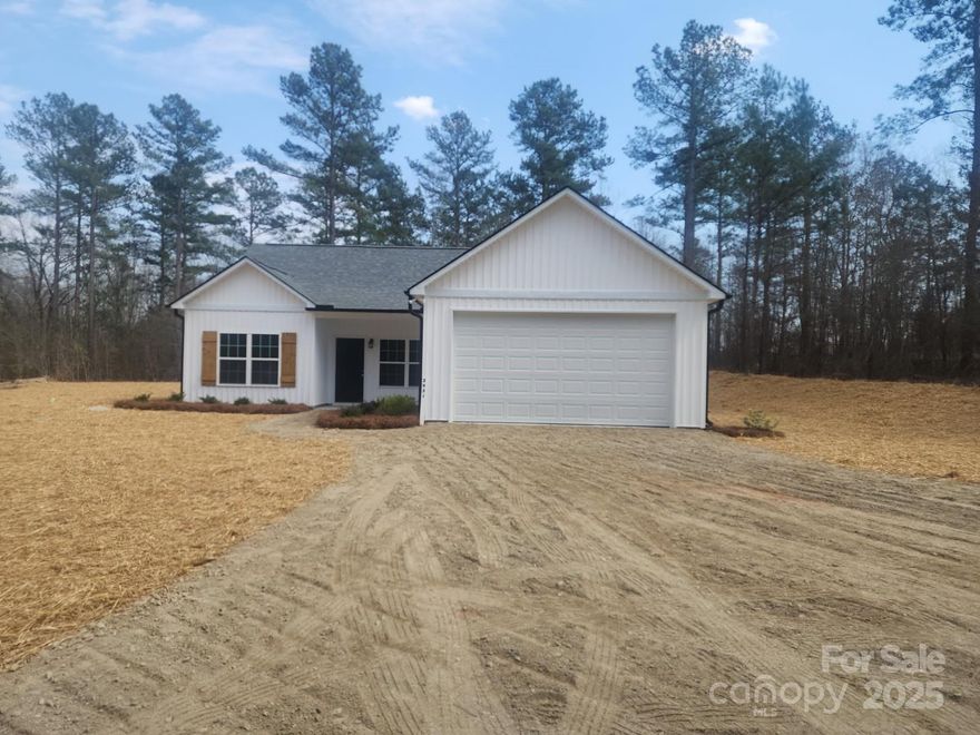 There is no wasted space in this adorable, 3 bedroom, 2 bathroom, proposed to be built floorplan, to be nestled among established trees, on a spacious 1.76 acre lot.  The split bedroom plan affords privacy for the primary bedroom/bathroom, that features double vanity and walk in closet.  The other two bedrooms have easy access to the full hall bathroom.  The eat in kitchen, features granite counters, wood cabinets, SS appliances and is open to the great room. There is a front load garage.  If you are looking for proposed new construction, outside the city limits of Pageland, with room to roam, this one may be for you!