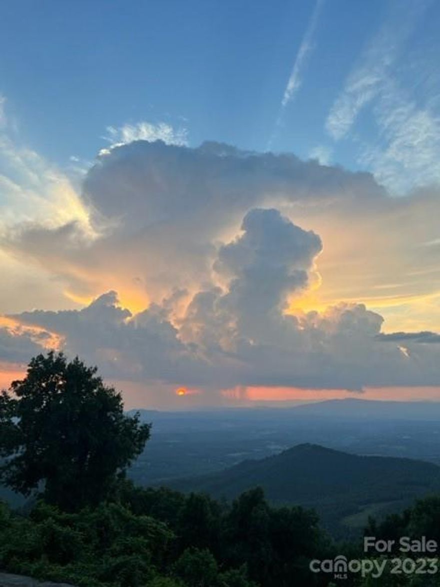 Two lots totaling almost five acres nestled in the South Mountains in the gated Silver Creek Springs community.   The property Sets at the end of Laurel Ridge Lane in the cul-de-sac.  Come build your dream mountain home for a permanent residence or vacation home and set on your porch in the afternoon and listen to the creek at the bottom of your property.  The community has a newly updated (updated in 2023) club house with in ground swimming pool, outdoor grill, and breath taking views!