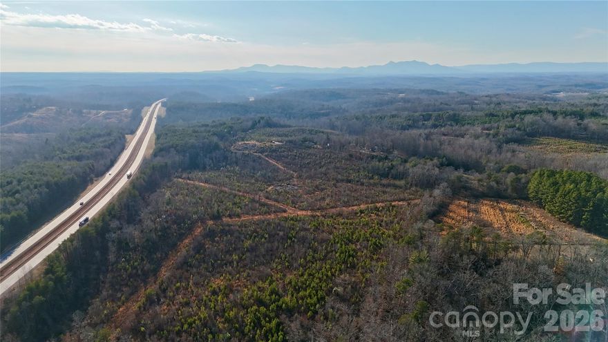 BRAND NEW TO THE MARKET! Approximately 18.89 acres of buildable land with mountain views located at 0 Brady Hampton Drive in Rutherfordton. Property features rolling terrain with areas where timber has been cut, offering multiple potential homesites. Quiet rural setting with privacy while still conveniently located approximately 15 minutes to Forest City, 15 minutes to Rutherfordton, and 40 minutes to Hendersonville. Ideal for residential, recreational, or investment use.