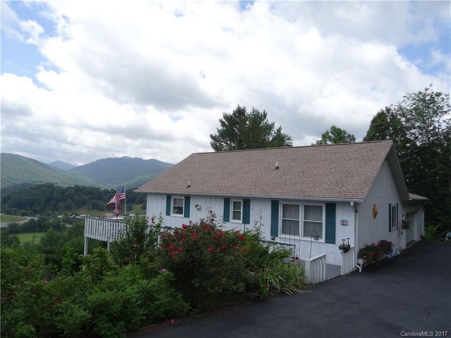 Only minutes to town, easy access & Located behind medical center & community college. House has 2 bedrooms on main level & 2 bedrooms on lower basement level. Septic permit unknown, pending copy. City water, kitchen appliances only a couple years old, heat pump & AC on main level, monitor heater on lower level. Amazing Views!!