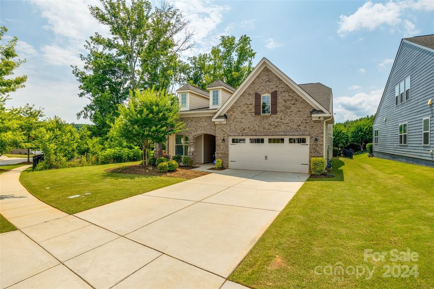 This stunning ranch home, located in the desirable Paddlers Cove community, is a pristine gem that is like new with its fresh paint and meticulous upkeep. The open floor plan is beautifully enhanced by custom built-ins and a striking feature wall with shiplap surrounding the cozy fireplace. The home offers a fabulous private backyard, perfect for both relaxation and entertainment, featuring a screened porch, a large patio, and a fenced-in yard ideal for your furry friends. The level lot ensures easy maintenance and a seamless outdoor experience. Situated in a prime location, this home is part of the highly regarded Clover school district and is just minutes away from the Lake Wylie boat landing and the Charlotte, NC border. The versatile third bedroom can serve as an office or flex space, adding to the home's functionality. This residence is truly clean as a whistle and ready to welcome you into a vibrant and convenient community.