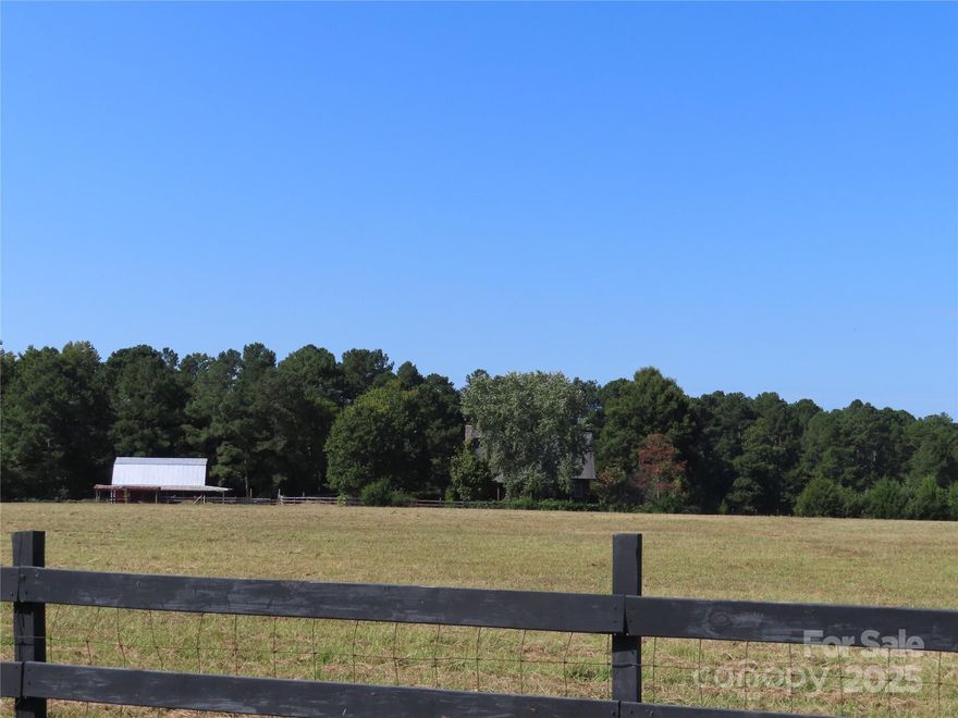 Bring your horses, bring your cattle! Come and see this gorgeous land and log cabin style home. Sitting off the road for maximum privacy. Enjoy watching your horses graze in the pasture. The  large rear screened porch will bring many hours of relaxation as well as entertaining. The barn is 36 X 24 with 3 stalls. The storage shed is 24 X 24 with an addition as well. There is a toilet and a sink in the barn as well as automatic water troughs in the 3 stalls. water is ran to the barn & shed areas .The barn has a loft that easily stores 150 bales of hay. There is a pulley system to hoist them up. Per the seller, there are 2 trails in the woods. New carpet upstairs.
Land is in farm use for reduced taxes. 2024 property taxes were 863.37