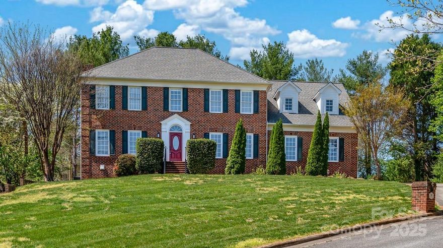 A stately and spacious full brick 2story centerhall colonial with a finished basement in the prestigious Moore's Ferry neighborhood; A covered boat slip with a lift on Lake Hickory is included! Entry Foyer separates the Living Rm and Dining Rm; Kitchen with granite counters, an island, tiled backsplash, pantry; Large 1st floor Den w/a gas logs fireplace and built-in cabinets; 1st flr Bedrm; 1st floor full bathrm; 1st flr laundry room was converted to a 2nd walk-in pantry; Large Primary Bedroom with a heated floor, 2 walk-in closets, jetted tub, separate shower; 2nd flr Bonus Room has the laundry location, a built-in desk and can be a 5th bedrm; Finished basement with a huge den with a bar and woodburning fireplace, full bath, a finished office and a workshop; Hardwood flrs redone in 2023; 50 gal water heater 2016; Wifi irrigation; Large built-in safe in the bsmt; Open/covered trex deck; Cul de sac; With so much potential, this home is priced so you can put your personal touches on it: