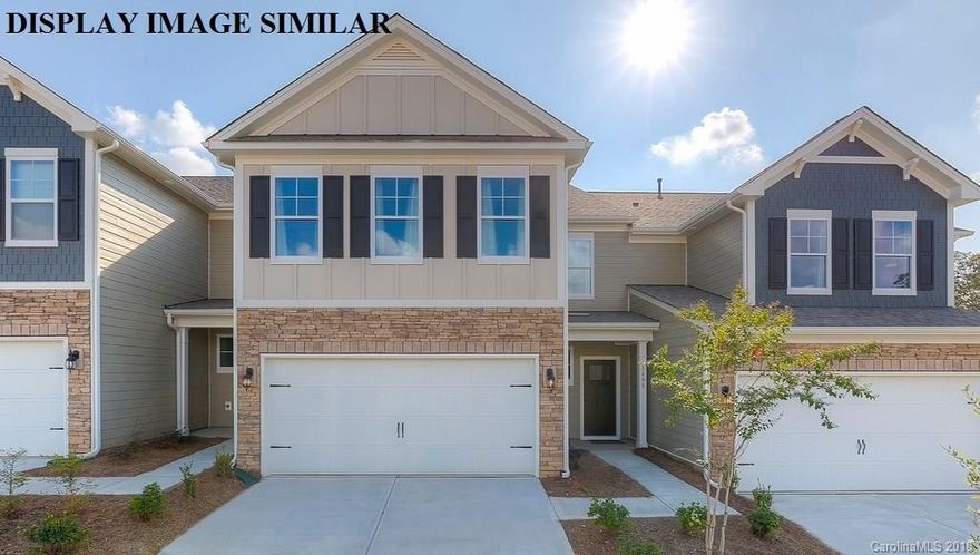 This 4 bed/3bath townhome has it all! Granite in the kitchen and in all baths! Hardwoods on the main floor and tile in all the baths and in the laundry room! This 2 car almost 2600 sq ft townhome is loaded with options and priced to sell!!