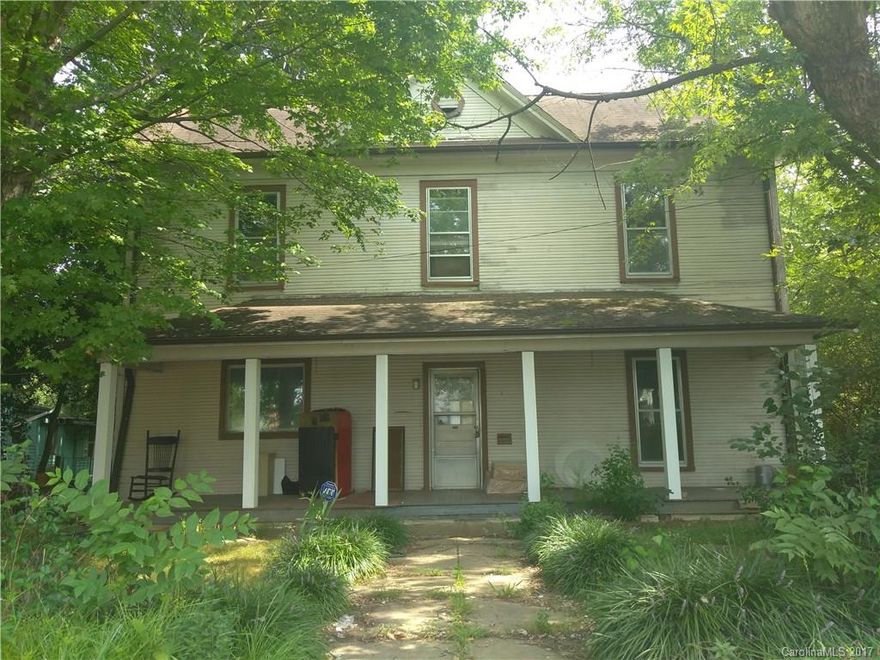 4 bedroom 1.5 bath- house great for a big family. With some "TLC" you can call this place home. Original hard wood floors. 2nd Kitchen on the first floor. Close to shopping and bus line. Priced to sell. Home is sold "As-Is Where-'Is"