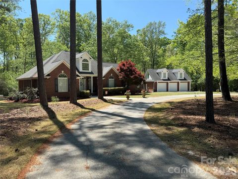 Photo of 221 Lakeshore Drive, Rockingham, NC 28379 (MLS # 4369580)