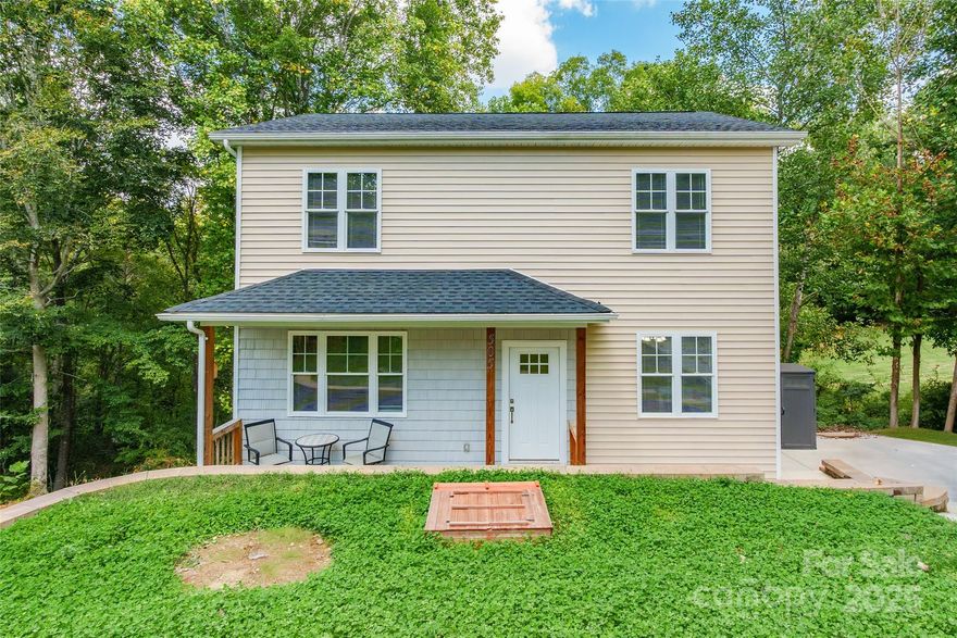 Charming 2-story home set on a spacious .88 acre lot featuring a welcoming front porch and a rear deck. Large, private lot is a blank slate for entertaining or gardening. Inside, the heart of the home is the kitchen with quartz countertops, offering both style and function.
