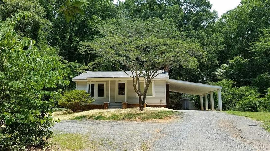 Cute 3 Bedroom home - Outside City Limits on Apx 1.75 Acres. Home has updated windows, Roof done in 2013, Septic pumped in early 2016, laminate flooring, Kitchen has new flooring - Appliances do not convey. Home Inspection done in Spring of 2016. View Today!