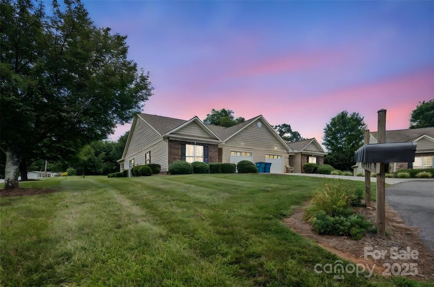 Welcome to this beautifully maintained 3-bedroom, 2-bathroom single-family home, perfectly located just minutes from downtown Morganton and all its amenities. Step inside to a warm and inviting living room featuring a cozy fireplace—perfect for relaxing evenings. The modern kitchen is equipped with stainless steel appliances, a spacious island for meal prep or casual dining, and plenty of cabinetry for storage. The home also features a dedicated office space, ideal for remote work or a quiet retreat. The primary bedroom offers a walk-in closet and an en-suite bathroom, providing both comfort and privacy. A separate laundry room adds everyday convenience. Enjoy outdoor living on the back patio, great for entertaining or simply unwinding. Additional highlights include an attached garage and easy access to shopping, dining, parks, and schools.