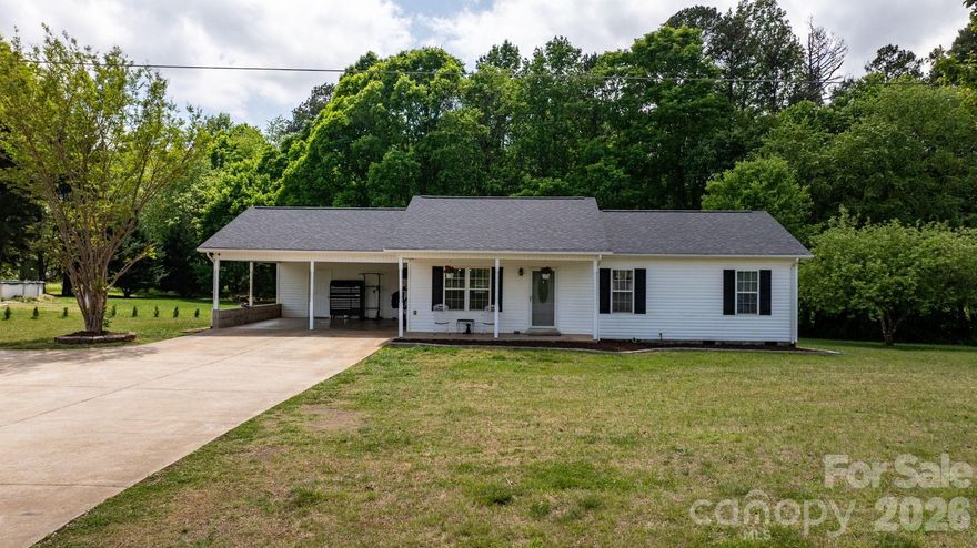 Look no further—this beautifully maintained 3-bedroom, 2-bath vinyl ranch is ready for its next owner! Enjoy peace of mind with a NEW architectural shingle roof (2025) and a NEW heat pump/central air system (2026).
The main-level double carport provides convenient access with just one step into the home. Inside, you’ll love the open floor plan, perfect for entertaining, cooking, or simply spending quality time together. The kitchen features a spacious eat-at island, making it the heart of the home.
A conveniently located laundry room sits just off the dining area for added ease. Outside, the level lot offers plenty of space for play, gardening, or relaxing, and includes a wired storage building for extra functionality.
Enjoy the best of both worlds—no city taxes while still being just minutes from Highway 321, with easy access to Lenoir and Hickory. Located in highly desirable school districts, this home checks all the boxes!
