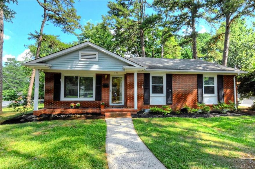 Darling updated brick ranch! New hardwoods, fresh paint, new kitchen w/ granite, glass tile backsplash & stainless steel appliances! Tiled bath with wainscoting, custom cabinets and tub/shower. Master w/ tiled 1/2 bath. Large corner treed lot with carport. Unbeatable location minutes to Uptown!