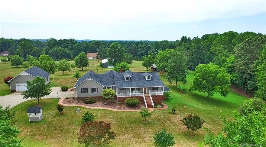 Absolutely immaculate, meticulously maintained 15 acre estate.  Completely renovated & updated w/granite, stainless steel appliances, hardwoods, tile, new paint & more - not a detail was missed.  Full finished basement w/kitchen, bath, & separate entrance.  2-car attached garage plus 2-car detached garage, barn, & equipment shed.  Find your peace amongst the pecan trees, crepe myrtles, oaks and maples – this property has been lovingly planned and maintained 25 years and now it’s ready for you!