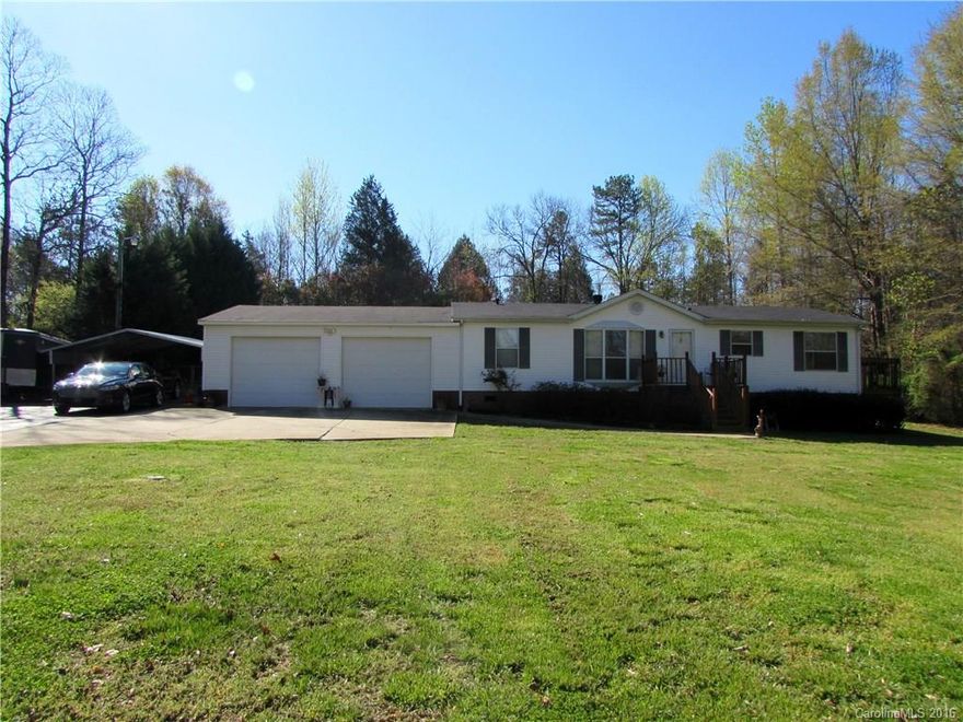 Very well maintained 3BR/2BA home on beautiful one acre lot with Bradford pear trees lining the drive. Master suite features walk-in closet, with garden tub and separate shower. Spacious kitchen with new flooring and island. Two car attached garage, separate carport and private fenced in yard. A must see!