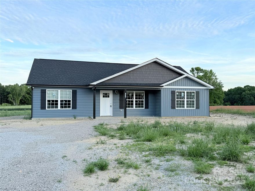 Discover this beautiful new construction home located in the sought-after Buford school district! Offering over 1,300 square feet of thoughtfully designed living space, this 3-bedroom, 2-bathroom home combines comfort and convenience in a peaceful, countryside setting.  Enjoy the open-concept layout with a seamless flow between the living room and kitchen, perfect for everyday living and entertaining. The primary suite features a private bath and spacious closet, while the two additional bedrooms provide plenty of room for family, guests, or a home office. Step outside to a covered patio that overlooks your expansive 1.3-acre lot—ideal for relaxing evenings or weekend get-togethers. With brand new construction, modern finishes, and a quiet, spacious lot, this home offers the perfect blend of style and space.   Don’t miss your chance to own a move-in ready home in one of Lancaster County’s most desirable areas. Schedule your showing today!