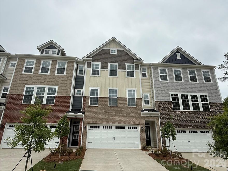 This new three-story townhome showcases a gracious design. The lower level features a bedroom and full bathroom  plus a desirable two-car garage. Upstairs is an open floorplan among the spacious family room, a well-equipped kitchen and breakfast room with access to a large deck. All three bedrooms, including the private owner’s suite with a full-sized bathroom, are ideally situated on the top floor to provide restful retreats. Plus, our signature Everything's Included program means you will get quartz kitchen countertops, stainless steel appliances, luxury vinyl plank flooring, and so much more at no extra cost! Close to downtown Waxhaw, local shops, restaurants, retail and grocery stores. Just a short drive away are Uptown Charlotte and the Promenade at Carolina Reserve shopping center.