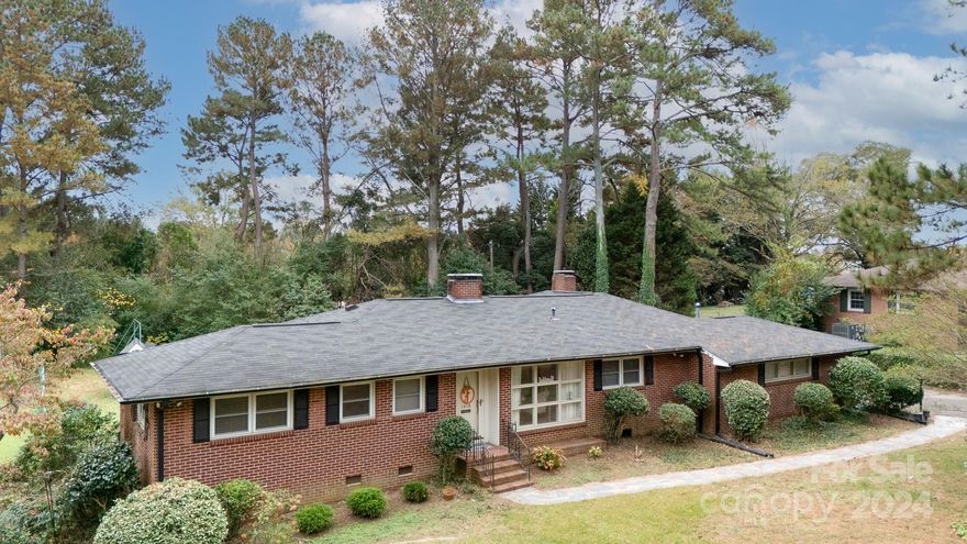 **$10K BUYER ALLOWANCE FOR UPDATES OR INTEREST RATE BUY DOWN **

LARGE FENCED YARD! BRICK! ONE LEVEL!  This fantastic home will provide lots of space for entertaining as well as spacious living!  You have 3 spacious bedrooms w closets and built ins.  The primary bedroom has an attached bath and walk in closet.  Kitchen has loads of cabinets, work island, wall of built in cabinets and don't miss the pantry!  The dining room has built in china hutch and room for large dining table OR if you could use this space as an office.  The large family room is equipped with real wood paneling, fireplace, built ins and overlooks the back yard.  There is a flex space at the back entrance which could serve as an office, exercise room, playroom or even a possible a teen room or inlaws guest space w/ it own outside entrance by the patio.   The workshop is suitable for many needs, including hobbies, gardening or crafting and more!!  Per seller:.2019 HVAC,2015 ROOF!