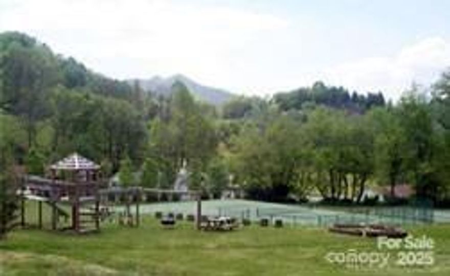 Wonderful location. Close to Waynesville Country Club. Easy build. City water and sewer. Paved road. Low HOA fees.