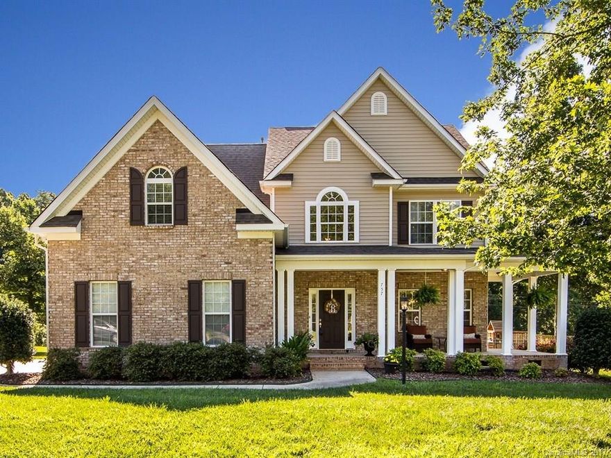 Stunning custom built 4BR, 2 story w/lots of hardwoods down. Welcoming front porch that wraps to the side. Gourmet eat-in kitchen w/fireplace. Deck overlooking huge level yard w/irrigation. Master bedroom has adjoining study/flex space. Must see! Great location, near I77, lake, & shopping!