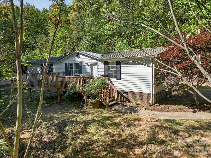 Welcome to 2324 Alfred Hartley Rd, a picturesque retreat nestled on the outskirts of Caldwell County. This inviting 3-bedroom, 2-bath home offers the perfect blend of modern comfort and rustic charm.

Step inside to an open floor plan that seamlessly connects the living, dining, kitchen, and den areas, creating a welcoming space for everyday living and entertaining. The cozy den features a beautiful wood-burning fireplace, perfect for relaxing evenings at home.

The spacious primary suite provides a peaceful escape, complete with an ensuite bathroom and walk-in closet. Outside, you’ll find a backyard ideal for entertaining, gardening, or even creating your own mini homestead. The large front deck offers the perfect spot to unwind, host gatherings, or enjoy quiet evenings.

Enjoy the balance of being conveniently close to town while still having the privacy and space you’ve been looking for. Don’t miss this opportunity to make it yours!