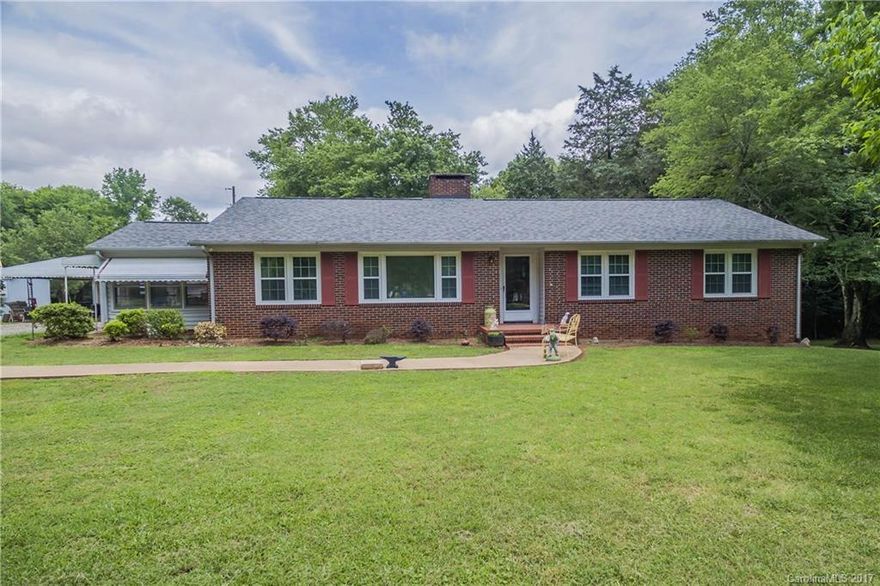 Bring your horses to this adorable farmette! A 6 acre lot, 3 bedroom, 2 bath home with basement & close to everything! Brand new roof, all new windows & new HVAC. Stainless steel Samsung appliances as well as 3 storage sheds to convey. Covered back deck to overlook your private oasis, sunroom has ceiling fan to enjoy all four seasons. Eligible for USDA 100% financing with $0 down!