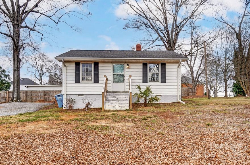 Welcome home to this charming bungalow near the heart of downtown Fort Mill! Perfectly combining character & potential, this home features beautiful hardwood floors & a bright, cozy interior that invites you to settle in. The spacious yard offers plenty of room for outdoor gatherings, gardening, or future expansion to suit your needs. Located on a tree-lined street, this home provides a quiet retreat while keeping you conveniently close to everything Fort Mill has to offer. Walking distance from downtown, Walter Elisha Park, local shops, restaurants, & Fort Mill's top-rated schools at your fingertips. Plus, with quick access to I-77, commuting or exploring Charlotte & surrounding areas is a breeze, making this home a possible short-term rental for those looking for a convenient & charming stay. Whether you’re a first-time buyer, downsizing, or looking for a home to make your own, this delightful home is a rare find in a prime location. Don’t miss the opportunity, schedule a tour today!