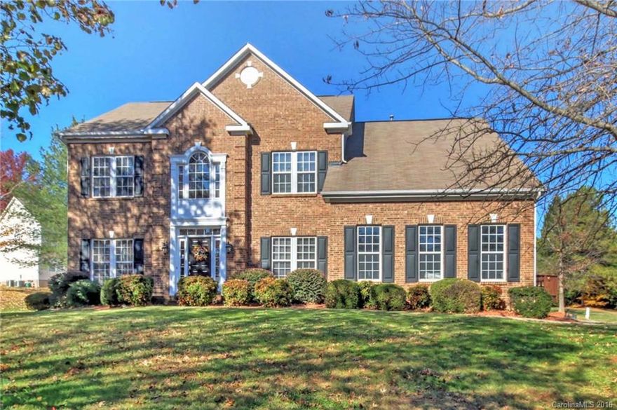 Unprecedented high-end upgrades! STUNNING 4BR w/bonus rm upstairs. Water view & huge cul-de-sac lot. 1st flr features add'l BR/office w/closet & access to bathrm. (could count as 6 BR) Hard wood flooring throughout. Kitchn: slate floor, granite counter tops, stainless appliances, tile back splash, gourmet isld. Stacked Stone Fireplace. MRBR ~ custom cabinetry & custom closet, new tiled shower w/body jets. NEW carpet in every BR. Irrigation system, boat slip. Short walk to pool, boat slip & lake.