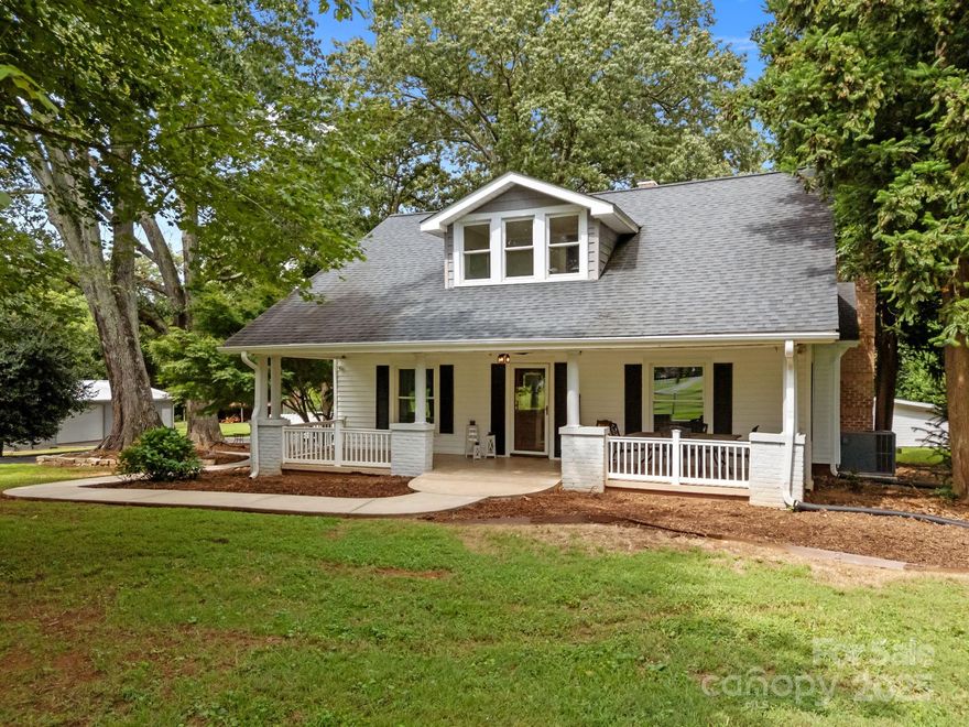This beautiful farmhouse on 6 manicured acres is the private retreat you've been waiting for! Perfectly blending modern comfort with classic charm, this 3 bedroom, 2 1/2 bath home offers endless possibilities for relaxing, entertaining, and potentially even having your business. Inside, you'll love the gorgeous hardwood floors & thoughtful details throughout. The main level has 2 spacious bedrooms, one with en-suite half bath, a full bathroom, living room, cozy family room, and a sunroom overlooking your land. The kitchen has freshly painted cabinets, a large island, stainless steel appliances, and connects seamlessly to a gorgeous dining room with built-ins and a punched tin ceiling. Upstairs, you'll find an oversized additional bedroom, a generous WIC, a spacious updated bathroom with separate laundry room, and a flex room ideal for an office, playroom, or workout space. Step outside to your private oasis-a saltwater pool, relaxing hot tub, outdoor bar, and pool bathhouse make entertaining effortless. The 1275 sq ft detached garage is heated and cooled, offering the perfect workshop or business space. Additional perks include a double carport with storage, barn, shed, and ample parking. Ideally located outside city limits in the Carson district, this home combines tranquility, space, and convenience in one perfect package. This property truly has it all-space, privacy, luxury, and room to grow.