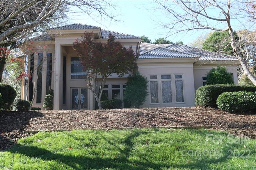 A Remarkable Haircoat Mediterranean Style located in Pellyn Grove Subdivision Transitional Floorplan with Marble and Tiled floors. The Seller was replacing the carpet when they decided to let the New Buyer select their choice. Two story Great Room with a Floor to Ceiling Coral stone face. Built-in TV. The 2 Story Kitchen is somewhat dated  appliances but attractive cabinets .Impressive 2 Story "Music Room" with Glass Windows that run from Floor to ceiling Private Hallway leads into the Primary Bedroom on the Main.. Luxurious Primary Bath with Marble Floors and Walls. Separate Vanities . Huge Closets with Built-Ins.3 Large Bedrooms Upstairs with two Full Baths At this price which is far below The Value for the Neighborhoods give the Buyer the opportunity to design this home in their own desires. Pool Size 765 SF