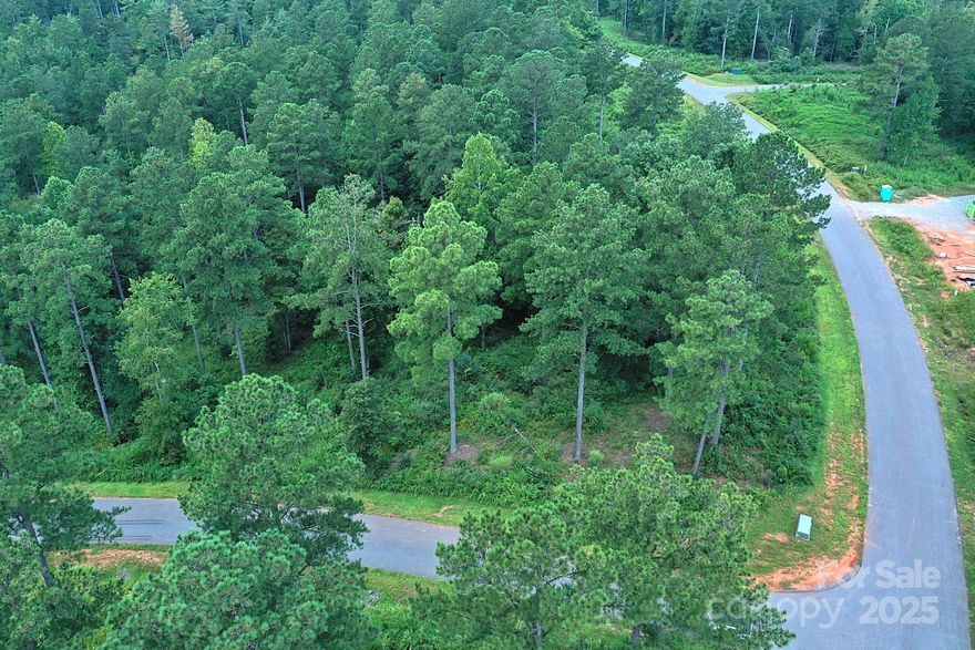 You've got over 2 acres to build on this corner lot in Lakeside Reserve. It's the perfect place to build your dream home. Lakeside Reserve offers some of the best amenities on Lake Rhodhiss, including a large, outdoor pool, pickleball courts, clubhouse, lakefront park, kayak launch, walking trails and more. This is luxury lakeside living just a short drive from Hickory, Morganton and many other amazing Western North Carolina destinations.