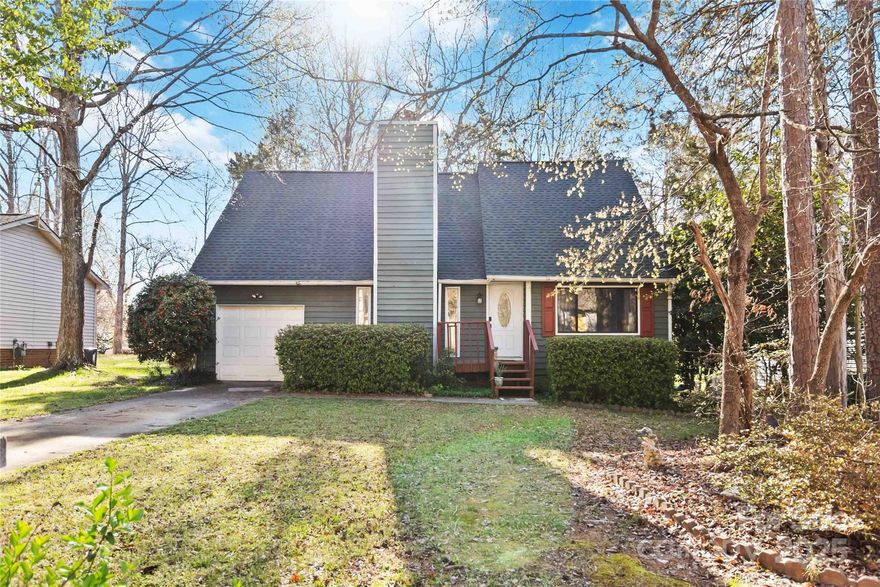 Welcome home to 5012 Rolling Oak Lane! This charming 3-bedroom, 2-bathroom home is located just off Lawyers Road in Rolling Oak neighborhood. The primary bedroom is conveniently located on the main floor, while two additional bedrooms and a spacious loft provide extra living space upstairs. The living room boasts a stone covered fireplace and vaulted ceilings that open up to the loft above, creating a bright and airy atmosphere. Just beyond the dining area, step through a sliding glass door onto a covered deck—perfect for relaxing or entertaining—overlooking a fully fenced, backyard. With a one-car garage, ample driveway space, and additional street parking, you’ll always have room for guests. New roof in 2024. Don’t miss this wonderful opportunity—schedule your showing today!