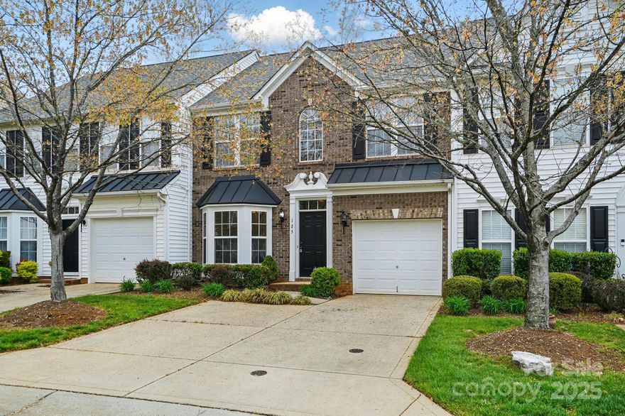 Welcome to your dream home!  This beautiful two story townhome perfectly blends comfort and functionality, nestled in the highly sought after Fort Mill area, just a stones throw from the vibrant Baxter Village and an array of shopping and dining options.  Step inside and discover a spacious layout with over 1800 square feet for unwinding and entertaining.  The formal dining room is ideal for hosting dinner parties and family gatherings, while the cozy breakfast area offers a sun lit spot for morning coffee or casual meals.  With three generously sized bedrooms and 2 1/2 baths, this home is designed for comfort and convenience.  The primary suite is a true retreat featuring not one but two walk in closets perfect for the fashionista!  Indulge in the en-suite bathroom equipped with both a separate tub and shower with frameless shower door, providing you with a spa like experience right at home. After market additions, radiant barrier, tankless water heater and more to create efficiency