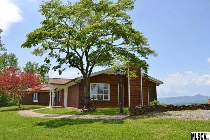 The BEST views in Burke County! Sweeping panoramic views from Table Rock to Grandfather Mountain on 9.8 private acres. Two bedroom, two bath brick home is move-in ready. Bring your horses - 2 stall barn and approximately 4 acres in pasture. Detached garage/workshop. New 30 year architectural shingle roof and gutters installed July 2013. Well on property has pump but not in use.