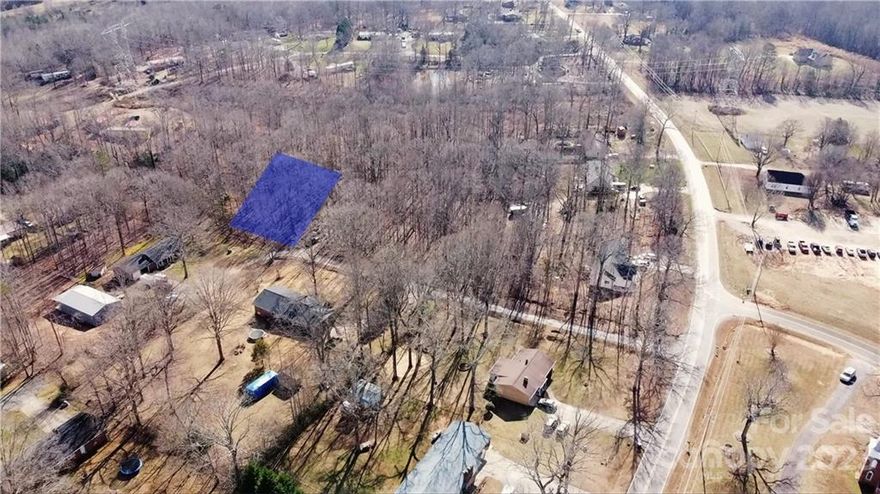 Great opportunity to build your home on a corner lot offering lots of privacy. Located just off of Dallas Cherryville Hwy. Septic permit attached. Seller has been told there may be an old abandoned well on the property but has no record of that.