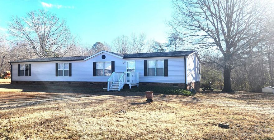 Back on market at no fault to seller, the previous buyers loan fell through. (This home is a 4 bedroom house however the septic permit is for 3.) In the heart of Vale, North Carolina, a charming residence awaits to script the next chapter of its story. Sitting on a quiet street, this 4-bedroom, 2-bath haven is more than just a house; it is a canvas of comfort, elegance, and the promise of a new beginning. Step through the front door, and you're greeted by a symphony of a lot of space and light. The open floor plan seamlessly connects the living areas, creating a sense of flow that is as inviting as it is functional. Natural light dances through the windows, casting a warm glow on the beautiful details that adorn each room.  This home has a spacious back yard, just waiting on its next owner. Roof is also has just been replaced recently, along with HVAC.