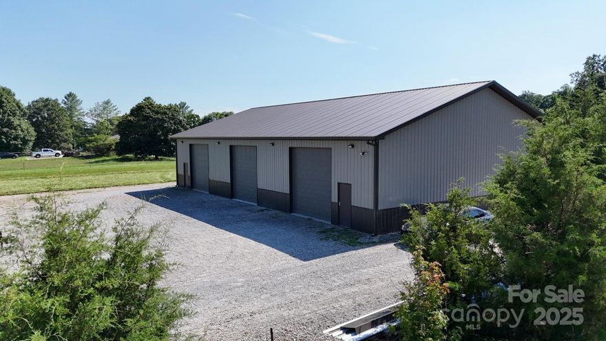 Build your dream home with a massive 4,000 SF steel workshop already in place! This 1.77-acre parcel in rural Statesville, NC (RA-zoned) allows single-family homes by right, no rezoning needed. The 50'x80' clear-span building features 14’ ceilings, (4) roll-up doors, 240V electric, partial insulation, and a security system. Forklift available for purchase. No septic or bathroom installed. County water available (tap = $2,080); buyer to install septic (est. $10K–$15K). USDA-eligible area, $0-down loans may apply. Enjoy no HOA, no city taxes, and easy access to I-40/I-77. Close to Fourth Creek Greenway, Jennings Park, and fiber internet expansion. Just 5 miles from a new 95-lot subdivision. Ideal for tradespeople, hobbyists, collectors, or homesteaders. Private, flexible, and full of long-term potential. Also Listed under MLS # 4290391

Price: $325,000
Shown by appointment only. Buyer to verify intended use.