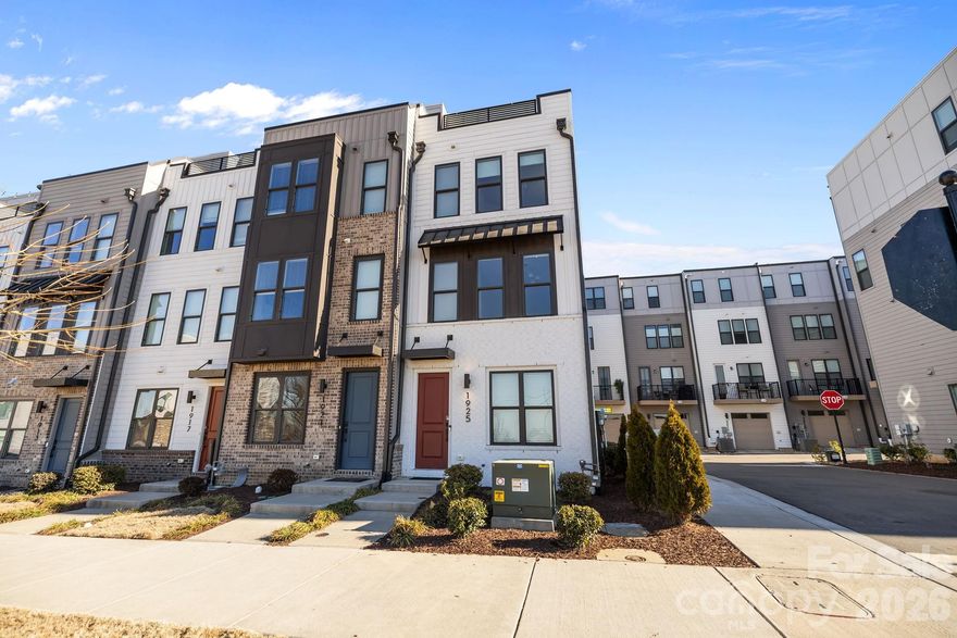 Experience elevated South End living in this exceptional 2023-built end-unit townhome, offering 3 bedrooms, 3.5 bathrooms, plus a versatile fourth-level retreat. Flooded with natural light, this residence showcases high-end finishes throughout, including a designer kitchen with a statement island, gas range with vented hood, built-in microwave, and dedicated eat-in area.

The primary suite features a custom closet system and a spa-inspired bath with designer tile selections. Upstairs, the fourth level provides a private full bedroom and bath, loft-style lounge, wet bar with beverage cooler, and access to a stunning sky terrace—perfect for entertaining or relaxing above the city.

Additional highlights include updated window treatments, an oversized tandem 2-car garage, and a premier South End location just steps to the light rail, shopping, dining, and entertainment. Ideal as a luxury residence or investment opportunity.