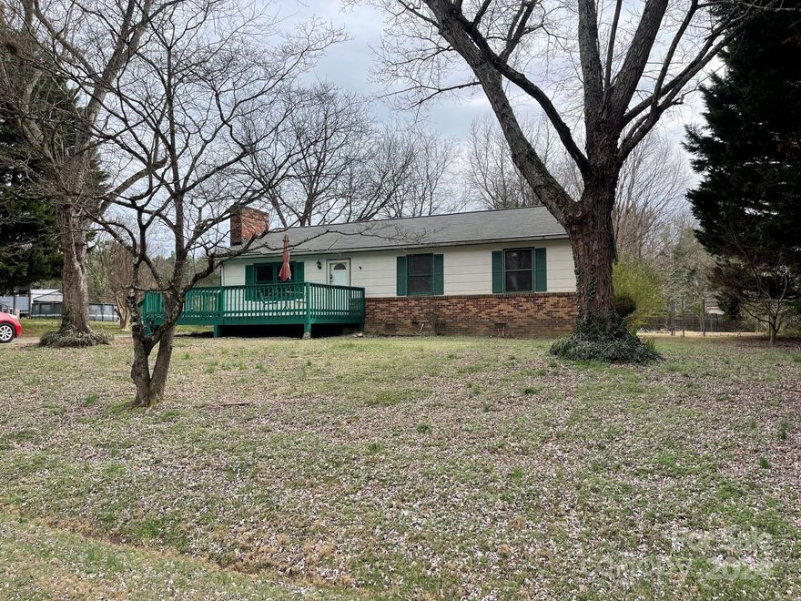 With 2 BR-2 Baths - VERY SPACIOUS This home is amazing for the right family! It needs a little TLC to make a great spacious home to grow in! It has a Large living room with a beautiful wood burning fireplace! A large eat-in kitchen!  Great quiet neighborhood. HUGE fully fenced in back yard.  The home is being sold as is. Some carpet will need to be replaced. It just needs your finishing touch to take it to the next level!  The price of the home reflects the repairs known to be needed!!!