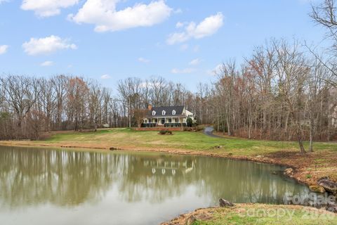 Photo of 7902 Southerland Drive, Browns Summit, NC 27214 (MLS # 4372307)