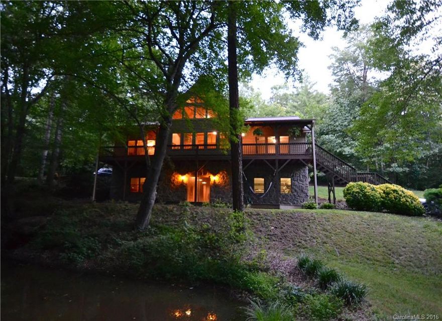 Beautiful home in a lovely wooded setting with it's own small spring-fed pond. Enjoy the tranquillity of this quiet neighborhood near the town of Clyde with a spacious great room and lots of glass to see out. Finished beams add to the quality appearance of this 3/3 home with both upper and lower driveways for ease of entry. New SS appliances and new carpet in the bedrooms give the feel of a much newer home. Lower level has a large family room, office, and bedroom as well as the 2 car garage.