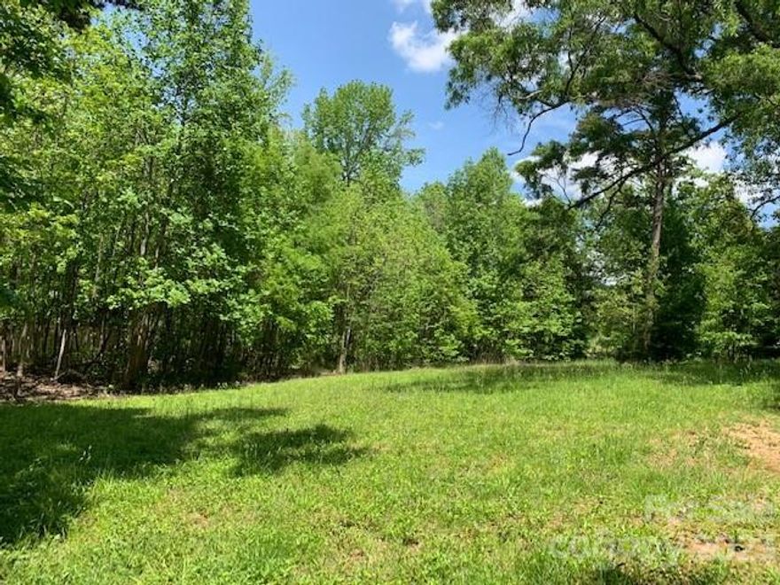 Rare opportunity 1.955 Acre Lot with Pond in the city. Waiting for build your dream home. Close to I85. Access to city water and sewer. Possibly will need to be rezoned according to the usage. This would be a wonderful location for townhomes if zoning permits.