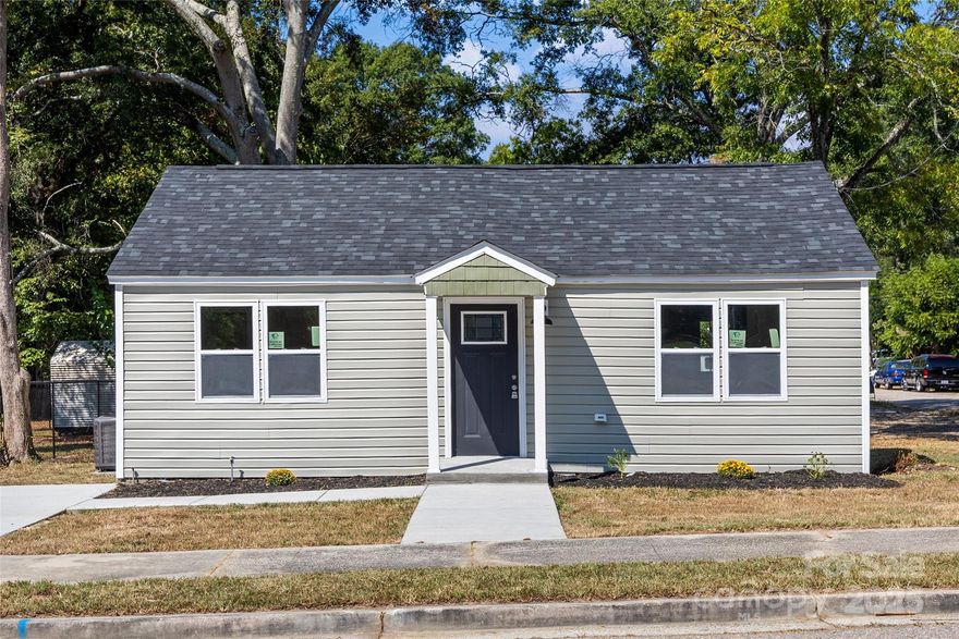 Charming Updated Bungalow in Rock Hill, SC! Step into this like-new ranch where modern updates meet classic charm. Every detail inside and out has been thoughtfully renovated with proper permits in place: New roof, siding, HVAC, countertops, fixtures, flooring, and landscaping and more. The bright kitchen shines with granite countertops, stainless steel appliances and stylish finishes, perfect for both everyday living and entertaining. Located in the heart of Rock Hill, SC, this home offers unbeatable convenience. All the essentials have been updated: new sinks, toilets, and fixtures, plus energy-efficient systems for peace of mind. Its cozy yet open layout, combined with the “cute factor,” makes it an inviting retreat close to shopping, dining and local amenities. If you’ve been searching for a low-maintenance home as a first time buyer or downsizing, this one checks every box. Schedule your showing now! Please see the MLS for owner finance details.