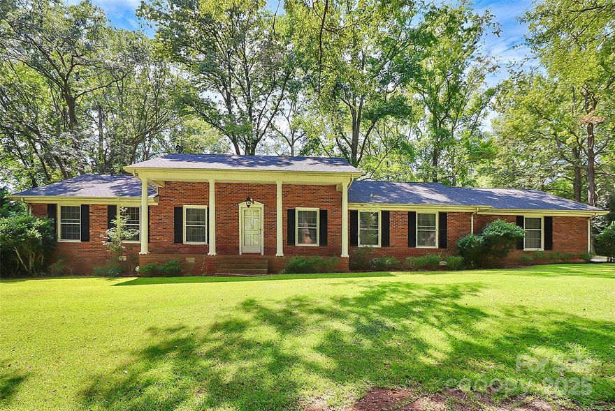 This charming ranch home, set on a .62-acre level lot in an established neighborhood, offers a blend of comfort and versatility. With a full brick exterior and a brand-new roof installed in 2024, the home is both sturdy and stylish. It features five bedrooms, including a primary bedroom on the main level along with two additional bedrooms. The upper level includes two more bedrooms and a half bath, making it ideal for a growing family or accommodating guests. The expansive outdoor building provides endless possibilities, whether you envision a Man Cave, She Shed, or Workshop. Enjoy the peace and quiet of living in a community with no HOA. Huge price reduction! Property being sold ‘as is’. **SELLER OFFERING Home Warranty from APHW $499.**
