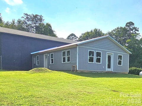 Photo of 225 Eighth Avenue, New London, NC 28127 (MLS # 4413315)