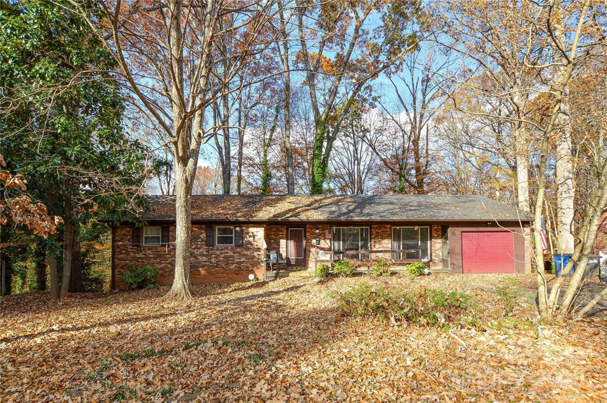 ***Sellers are offering $5000 in closing cost with an acceptable offer*** Welcome home to this all-brick property located in a well-established neighborhood and conventionally located near the intersections of I-77 & I-40 and various amenities. The home offers 1600sqft on the main level consisting of 3 Bedrooms with hardwood floors and 2 Bathrooms, spacious living room/dining room, kitchen and Den. The basement has an expansive 1610sqft of unfinished space, presenting an extraordinary opportunity for customization and enhancement within the property. This sizable area provides a blank canvas upon which homeowners can imprint their vision, to meet specific personal or family needs. With some renovations and careful attention to detail, this property presents a unique opportunity to establish a lasting residence.